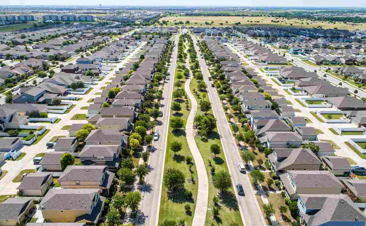 Suburbs neighborhood in Austin Texas showing residential roofs along several parallel streets