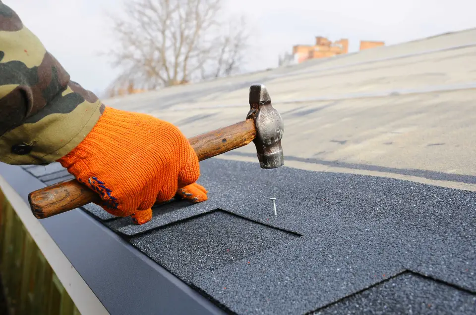 Common roofing issues like replacing a shingle