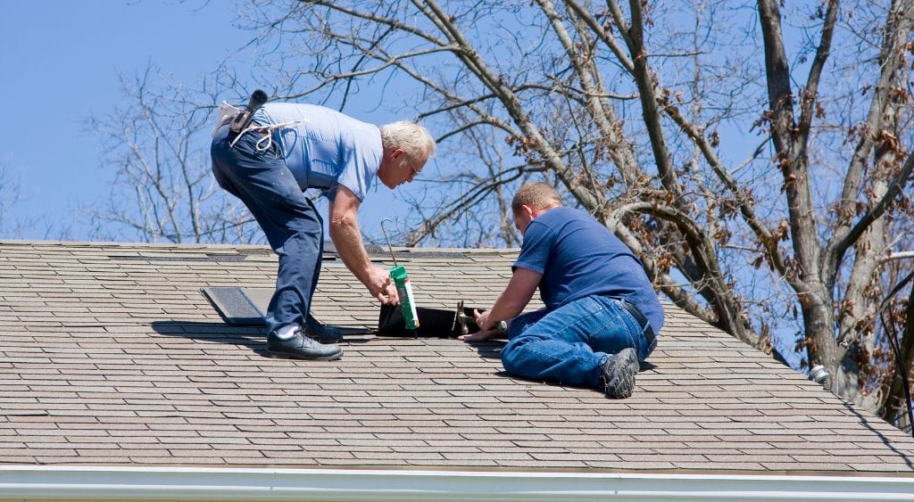 Arlington TX roof maintenance tips with seasonal weather highlights, including summer heat and winter freezes.