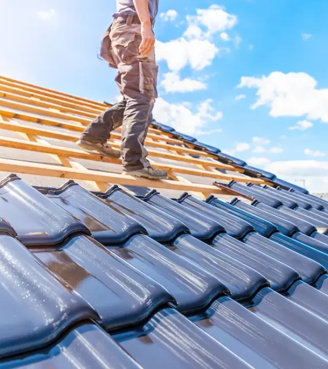 Waterproofing team applying protective coating on a building in Austin, TX