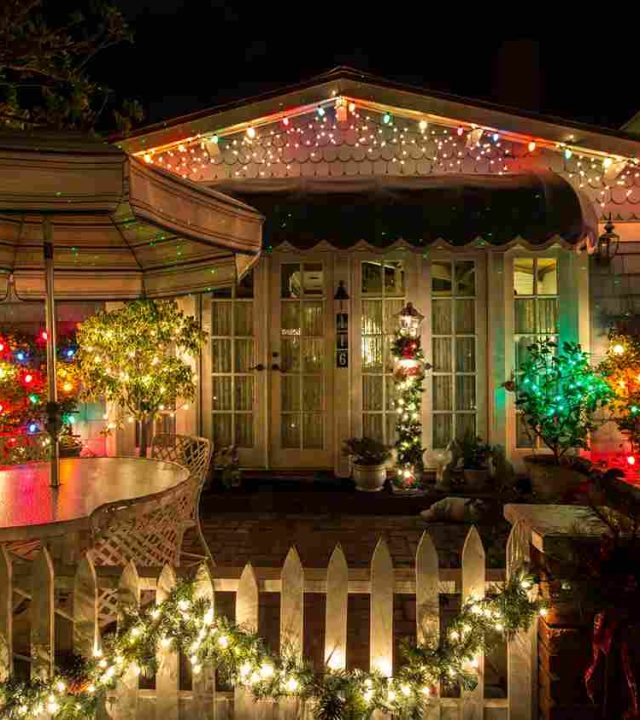 Festive holiday light installation on a home in Austin, TX